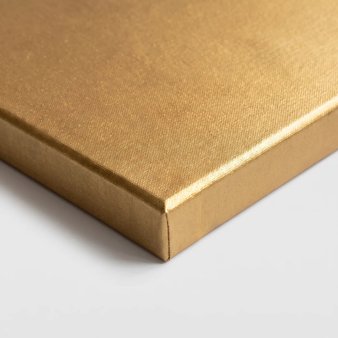 Roh zlatého plátna MIDAS spredu — pigment prechádza aj na bok